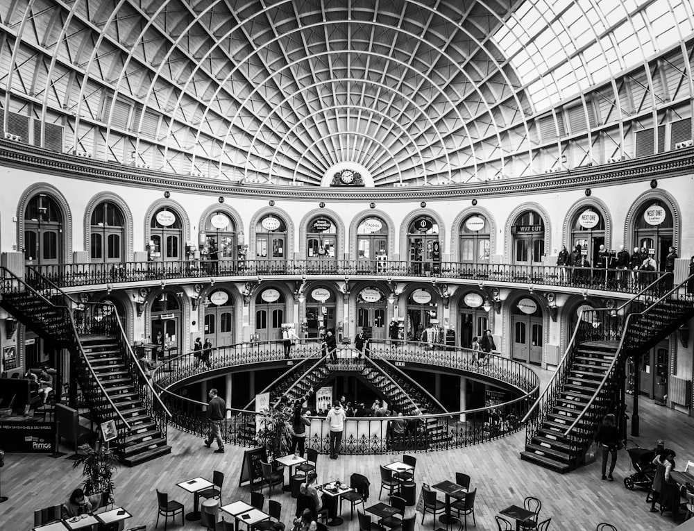 grayscale photography of building with staircase