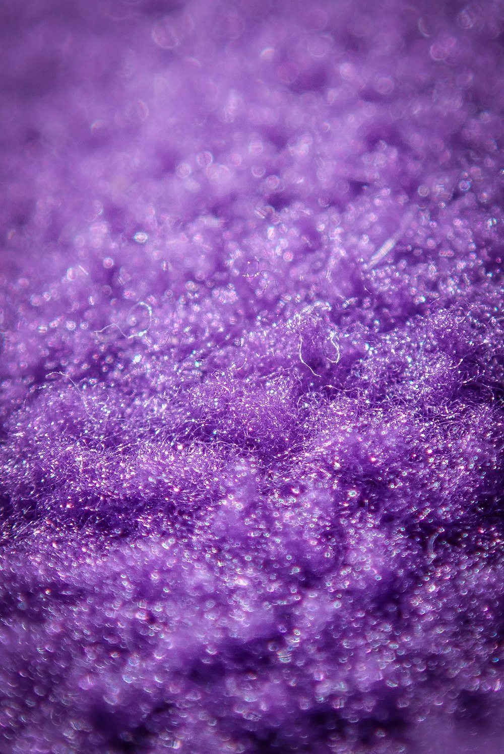 a close up view of a purple substance