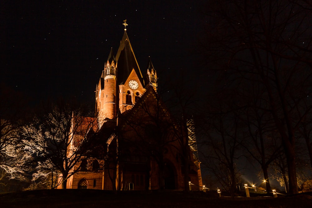 low-angle photography of red concrete castle