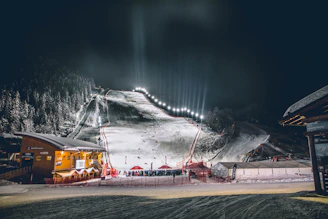 SnowArena Druskininkai ski slope bustling with winter sports enthusiasts