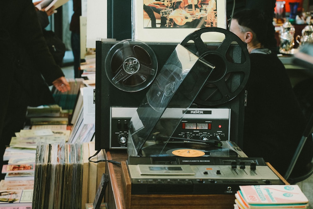 black reel-to-reel tape recorder