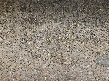 Close-up of crushed stone aggregate used in concrete foundations.