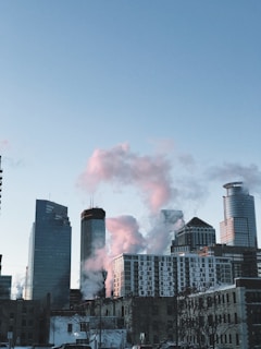 Before-and-after shots of a city skyline, showing smog replaced by clear blue skies.