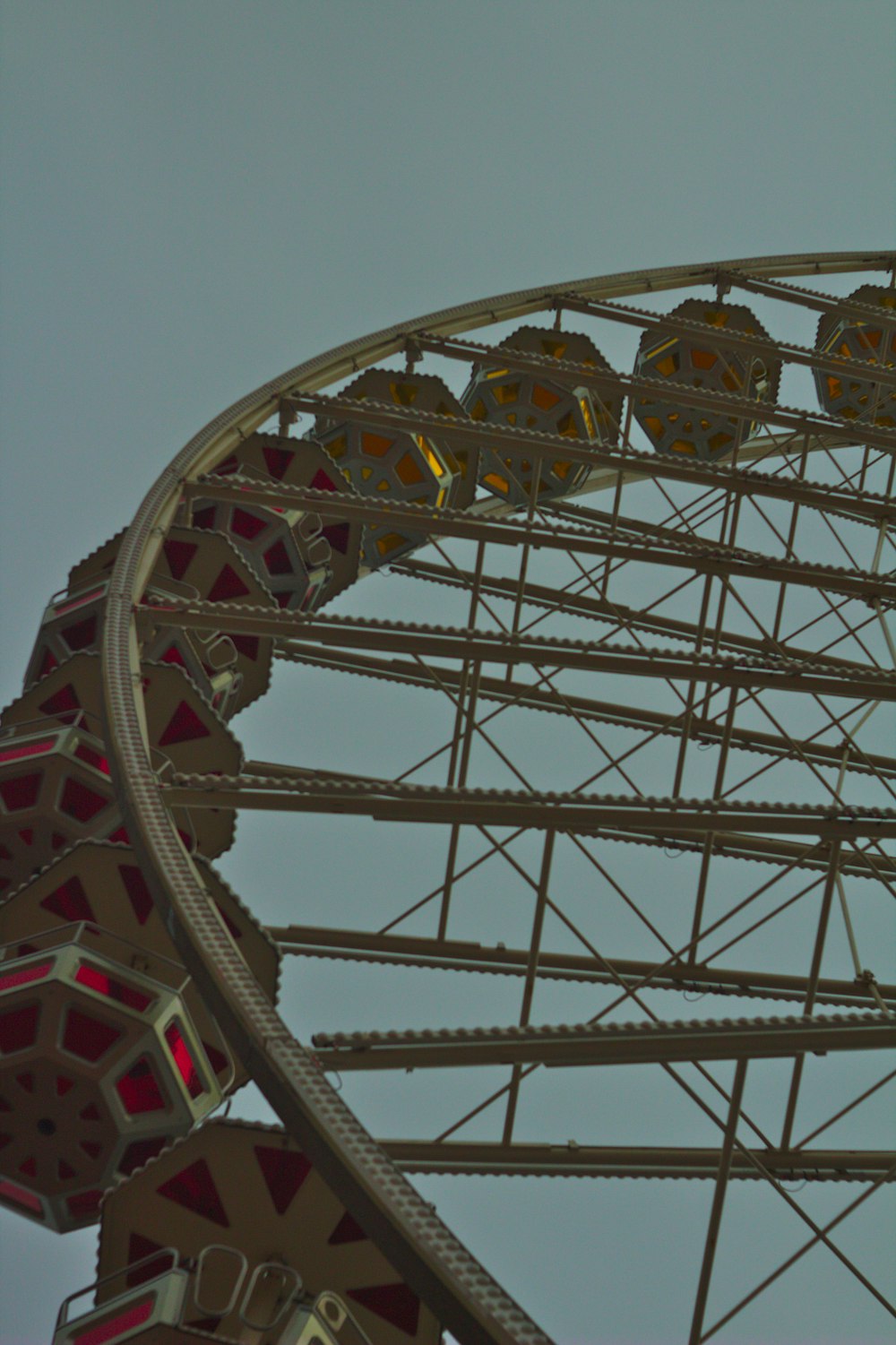 white, red, and yellow Ferris wheel