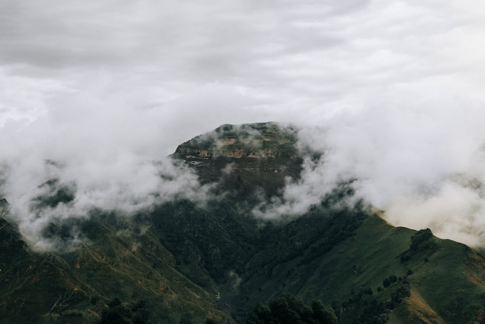 aerial photography of foggy mountain