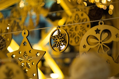 A close-up of handcrafted wooden decorations for celebrations.