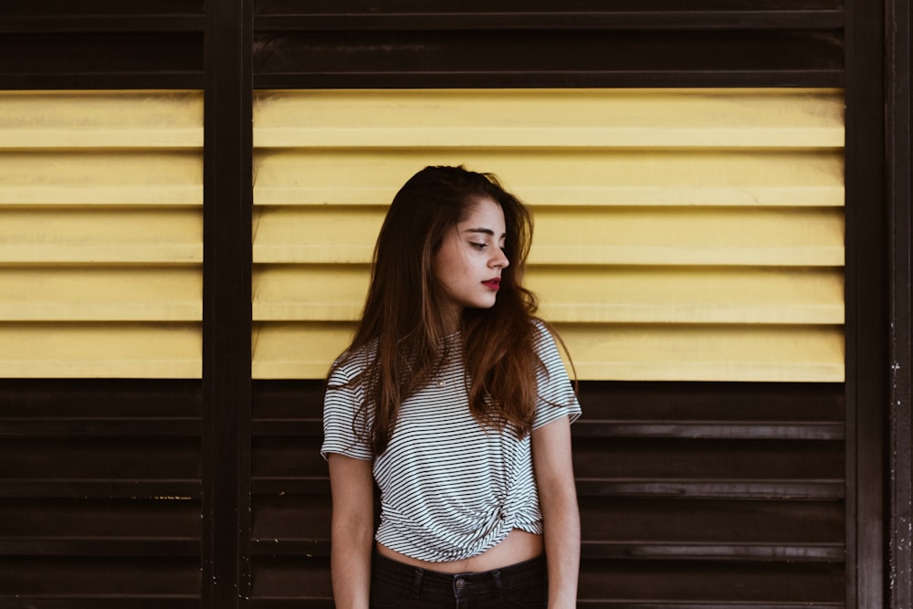 woman wearing white and black striped shirt