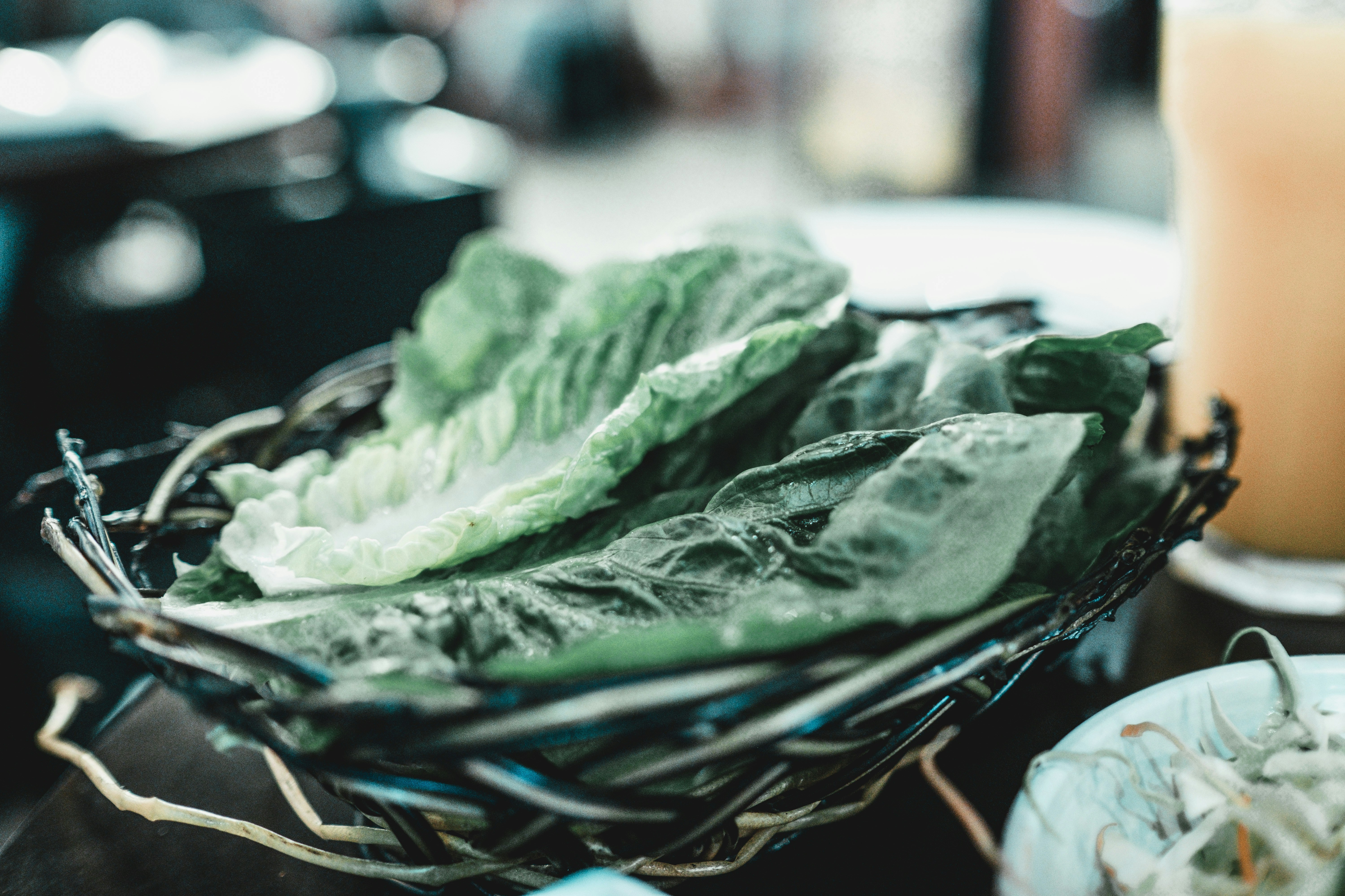 Lettuce leaves in a basket for Korean barbecue wraps