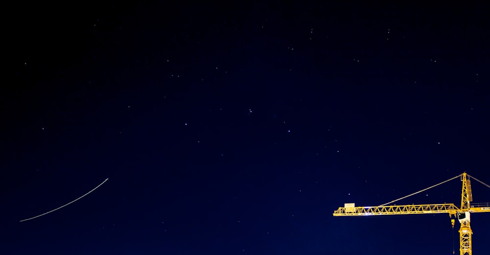 yellow crane during nighttime