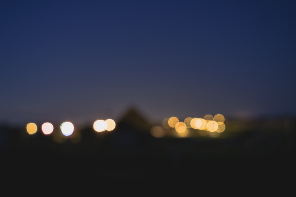 a blurry photo of a city at night