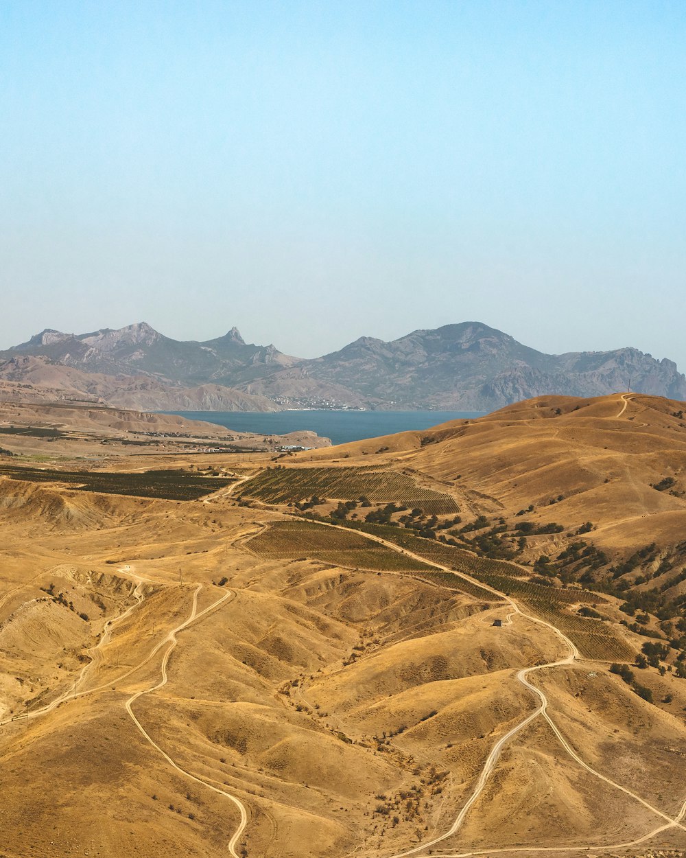 brown mountain under blue sky