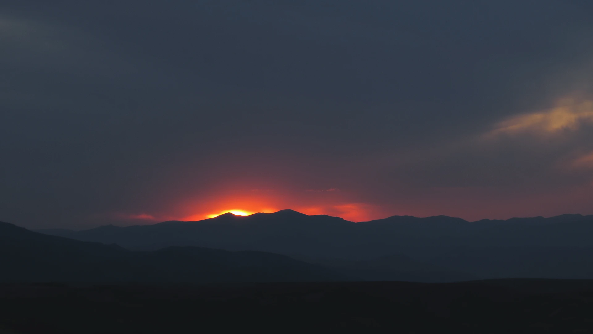 silhouette of mountain during sunset