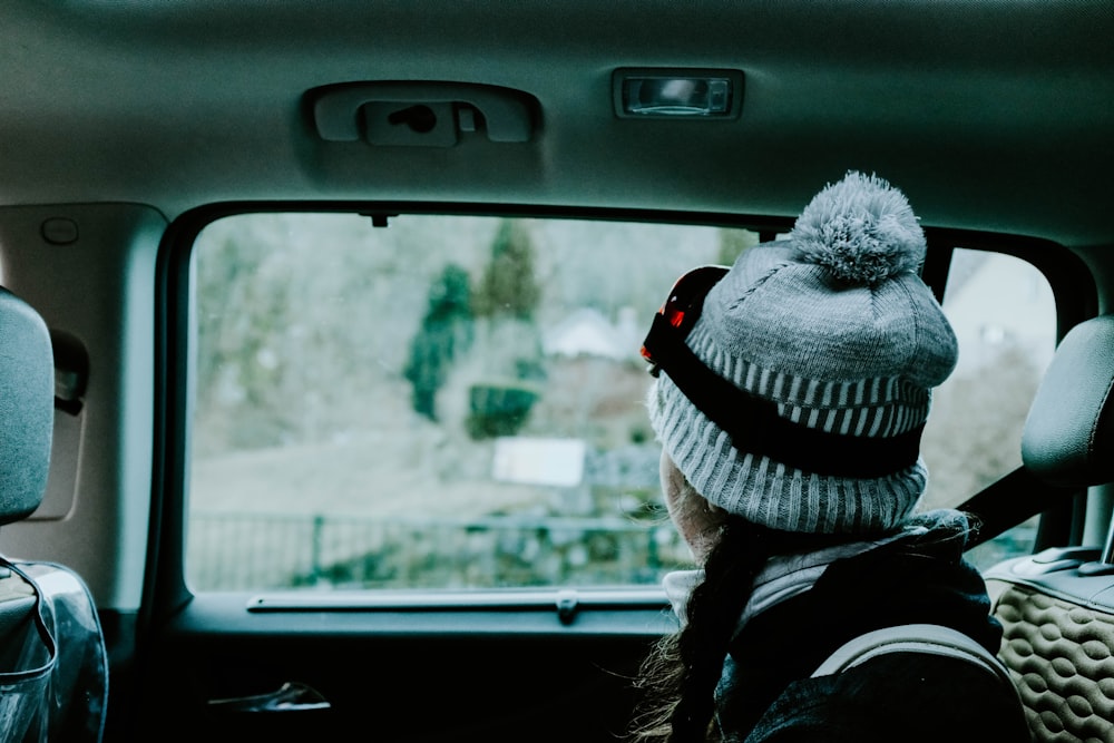 woman riding car