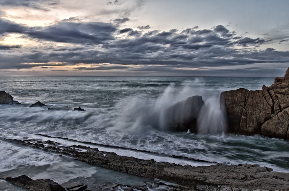 sea waves during golden hour