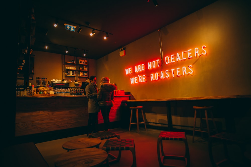 we are not dealers we're roasters neon sign