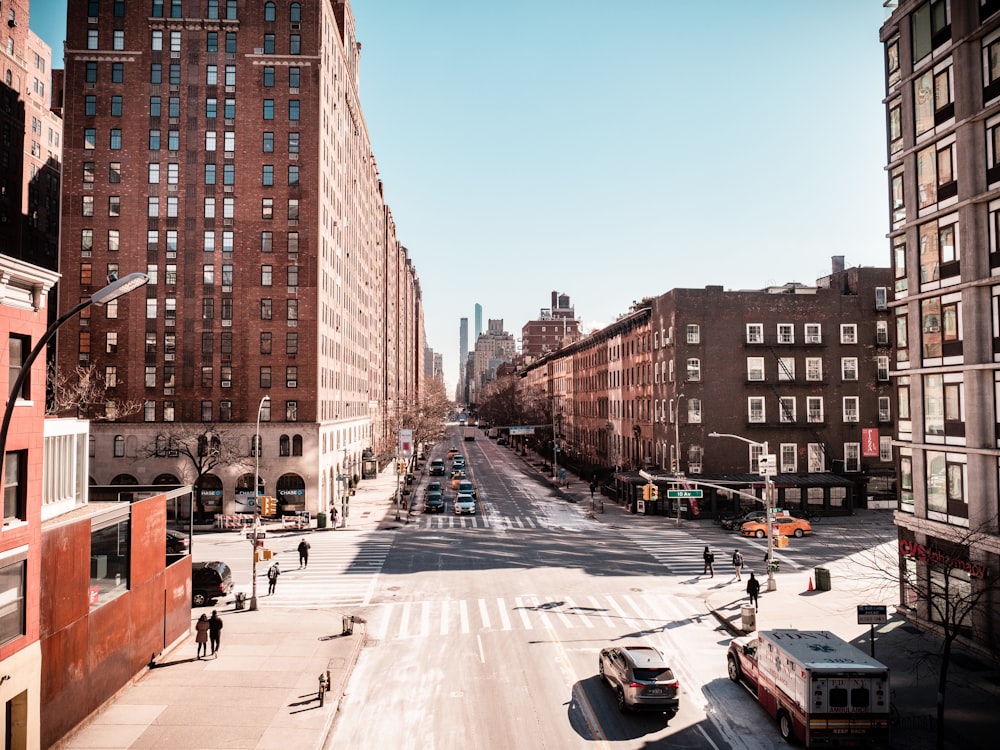 people walking on street near building during daytime