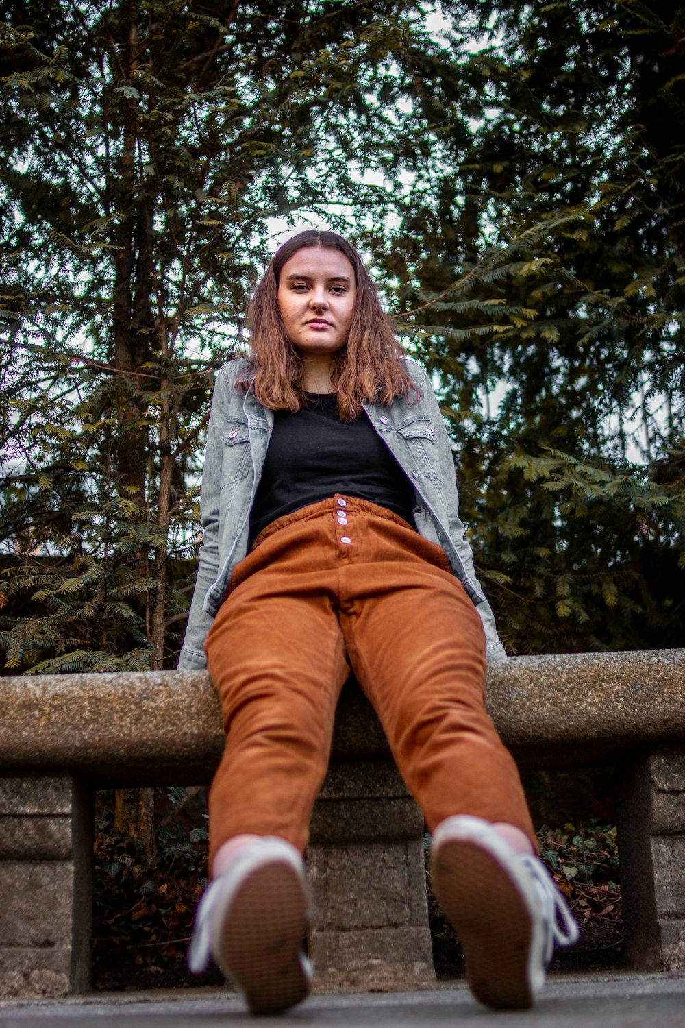 woman sitting on bench