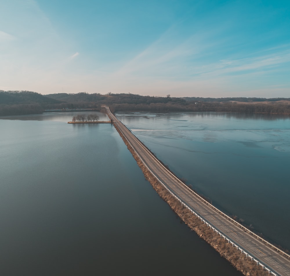 road beside body of water