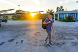smiling man walking while looking side view