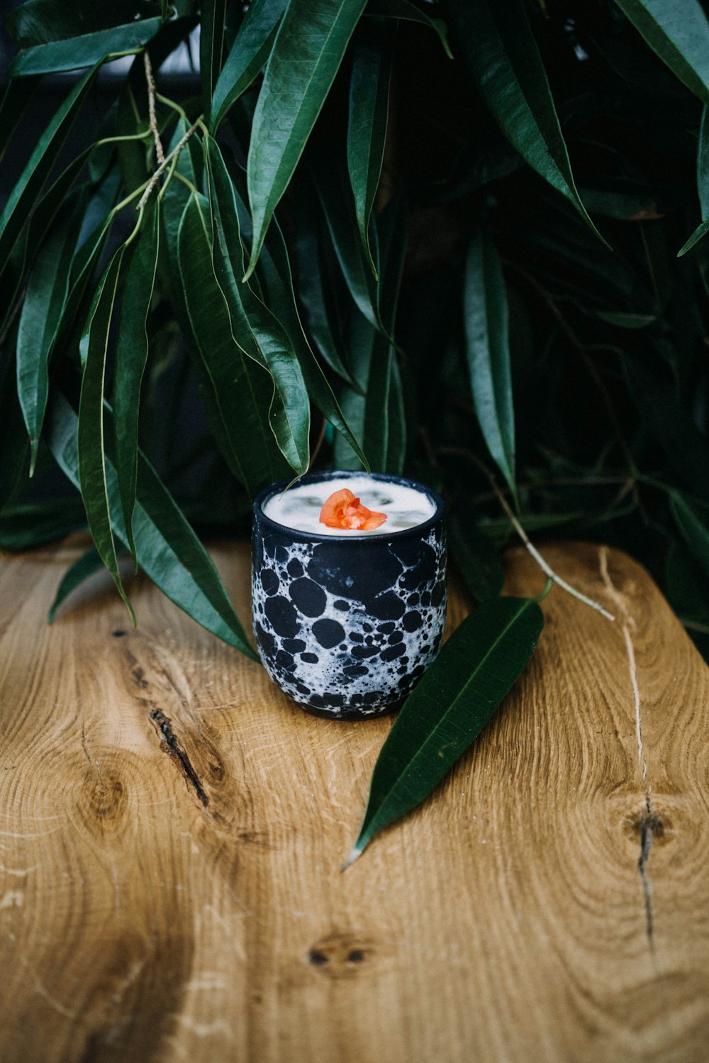 a candle sitting on top of a wooden table