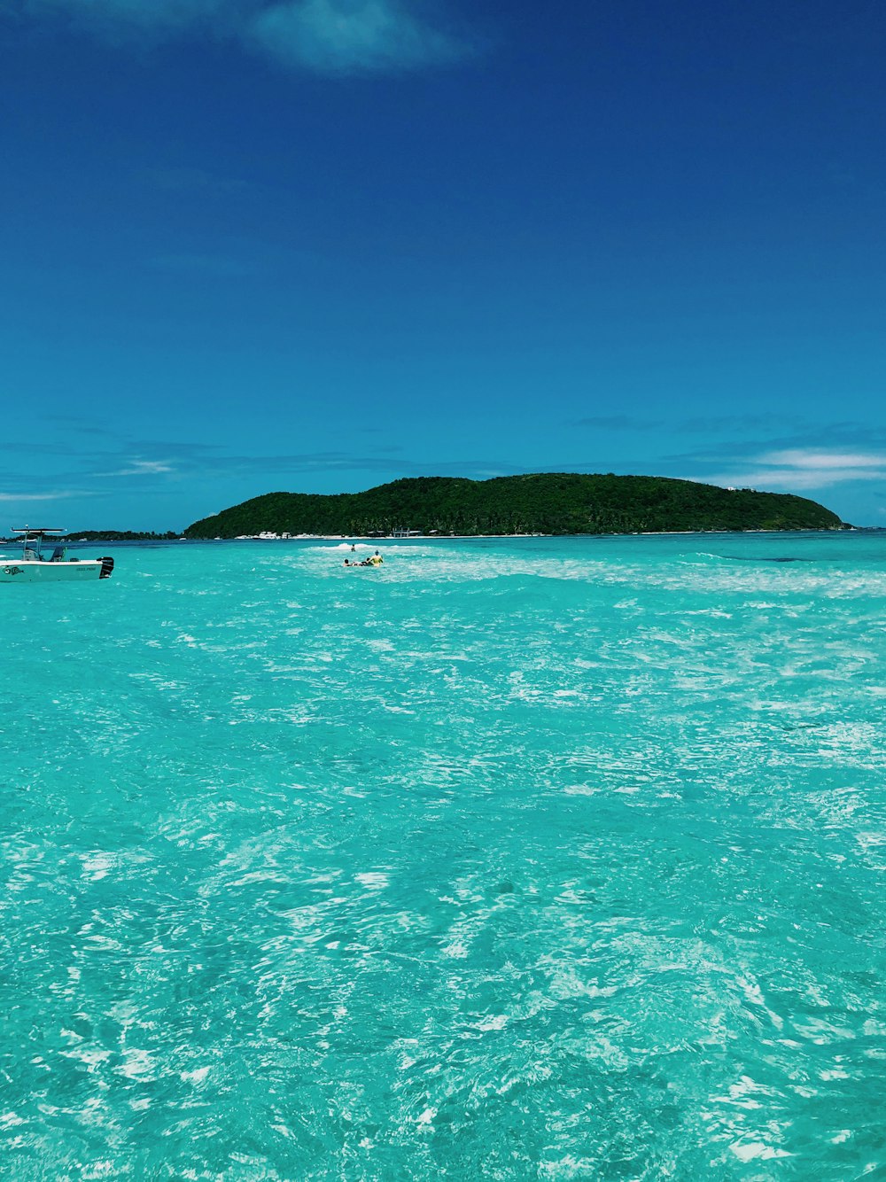 island at distance on ocean