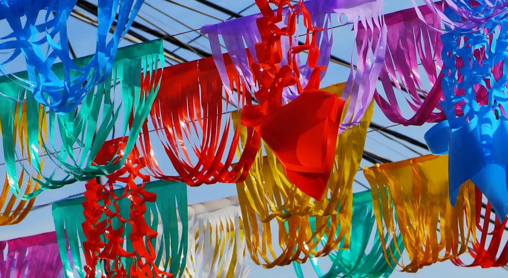 assorted-color hanging decors under blue sky