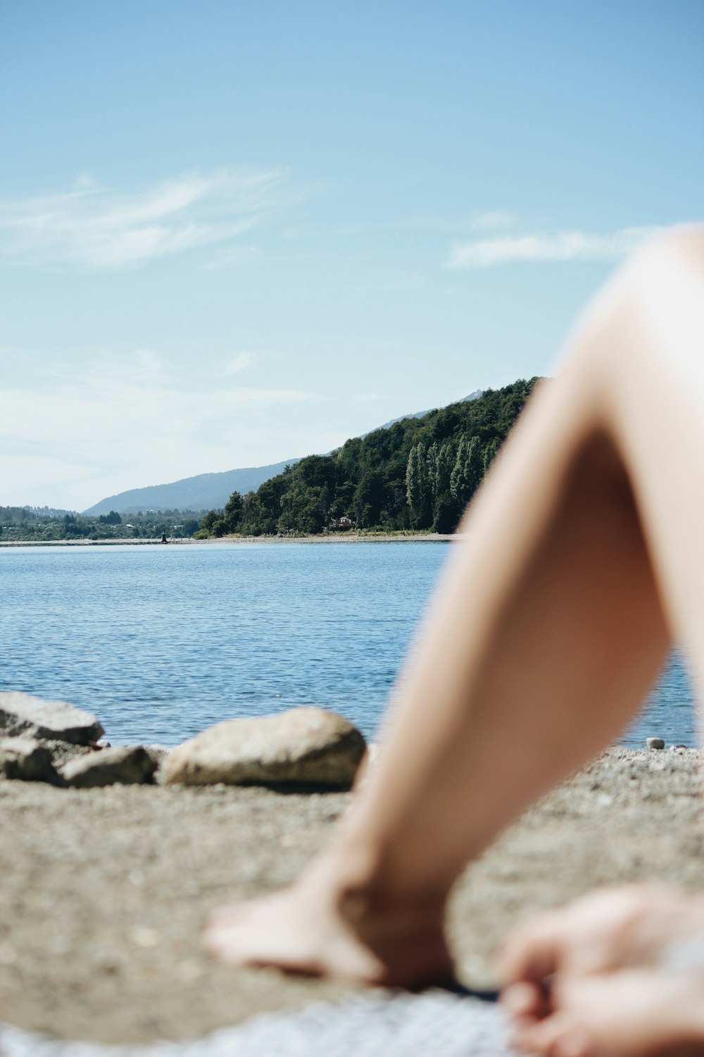 person on shore during daytime