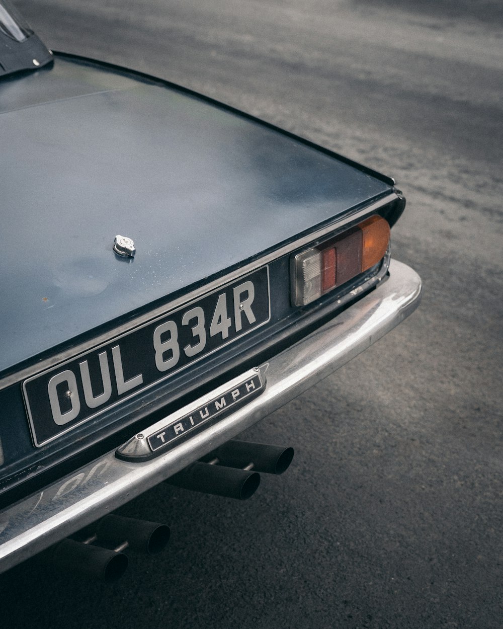 black Triumph vehicle close-up photography