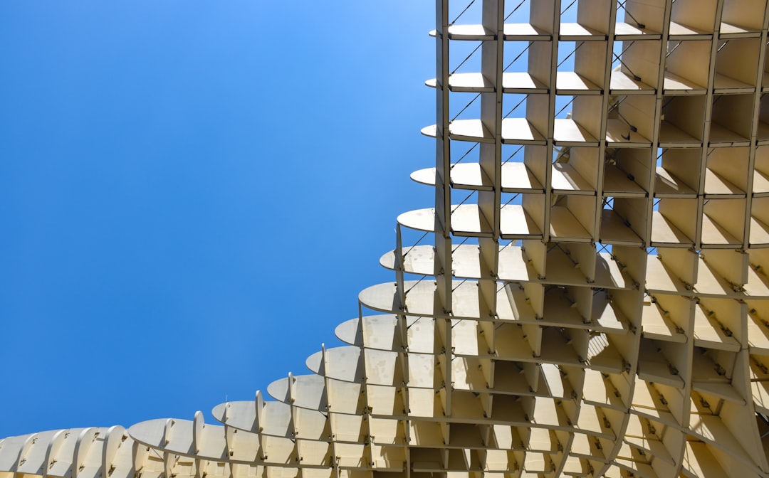 white painted building under blue sky