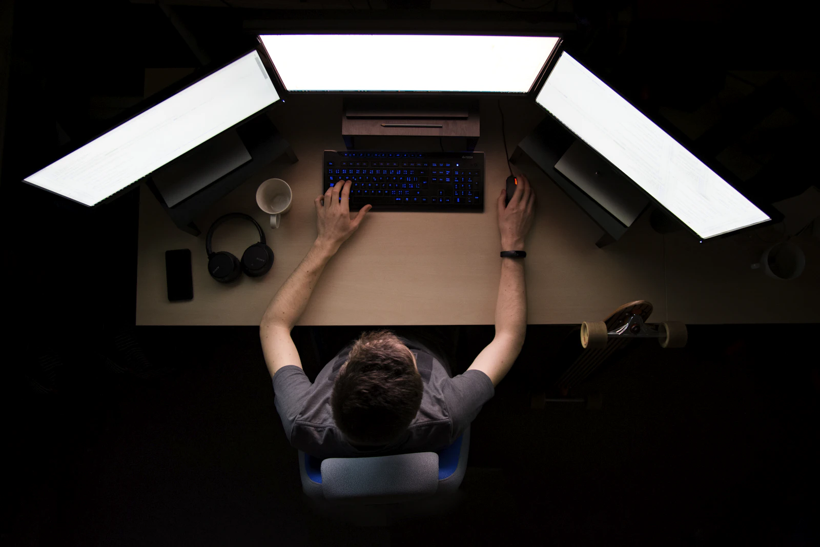 Desktop monitor and laptop sharing a tidy home-office desk