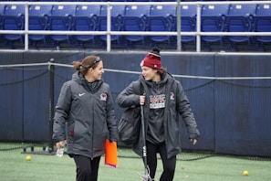 A meeting between an athlete and a business partner discussing project details