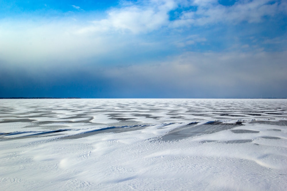 white sand under blue sky