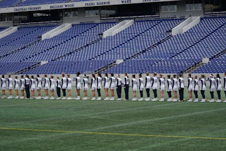 A team proudly displaying their custom sports uniforms on the field.