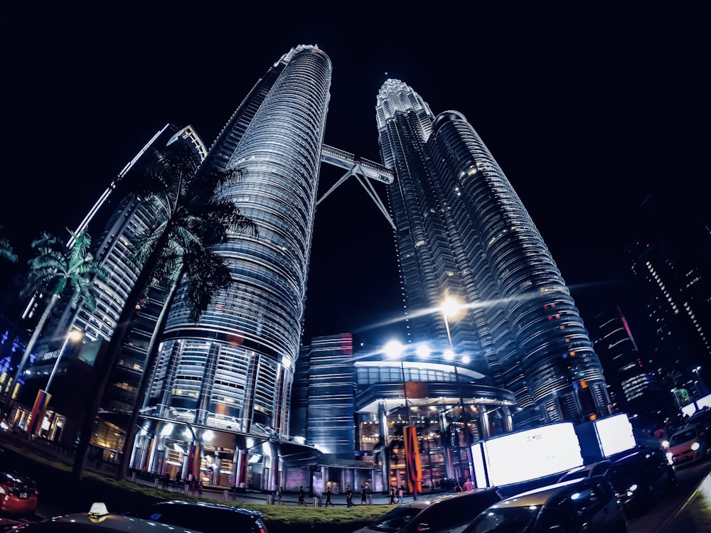 low angle photography of gray high rise building