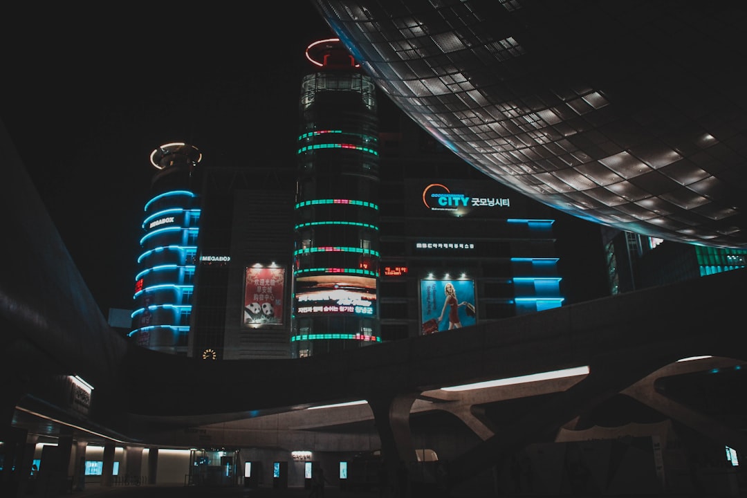 photography of lighted high rise buildings during nighttime