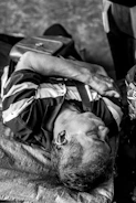 man sleeping on sack