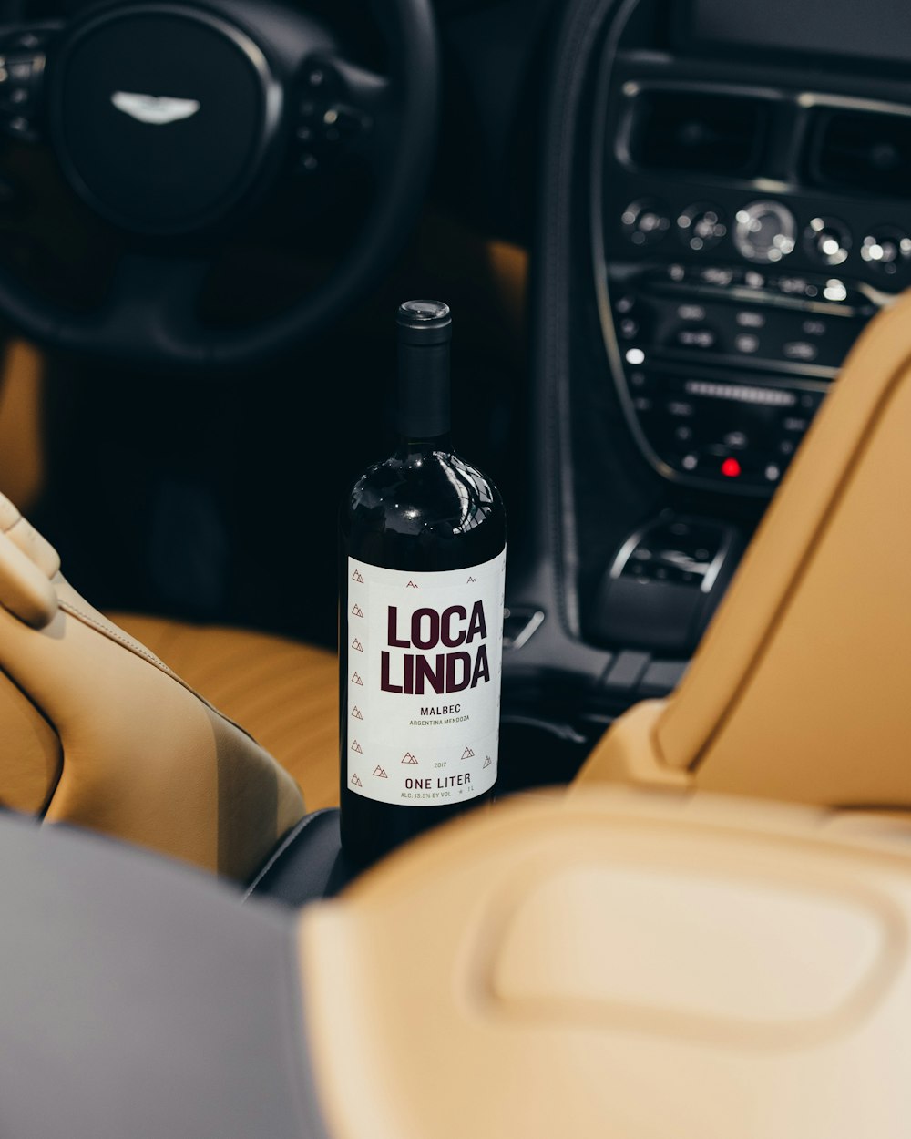 Loca Linda wine bottle on vehicle center console