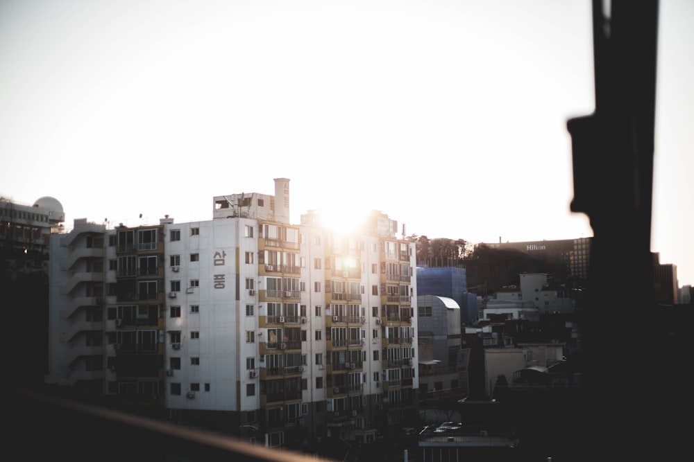 white buildings under white sky