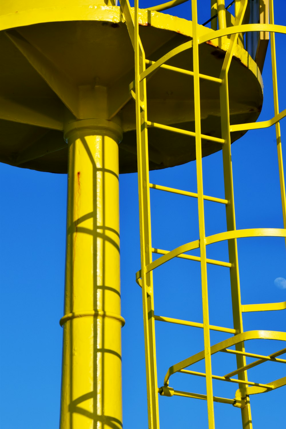 yellow metal framed under blue skies
