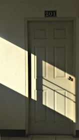 white wooden 6-panel door
