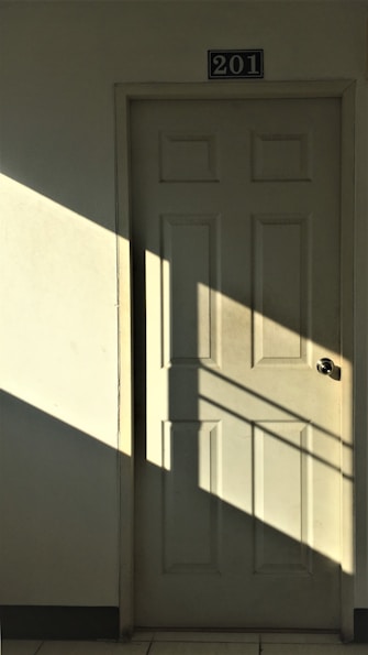 white wooden 6-panel door