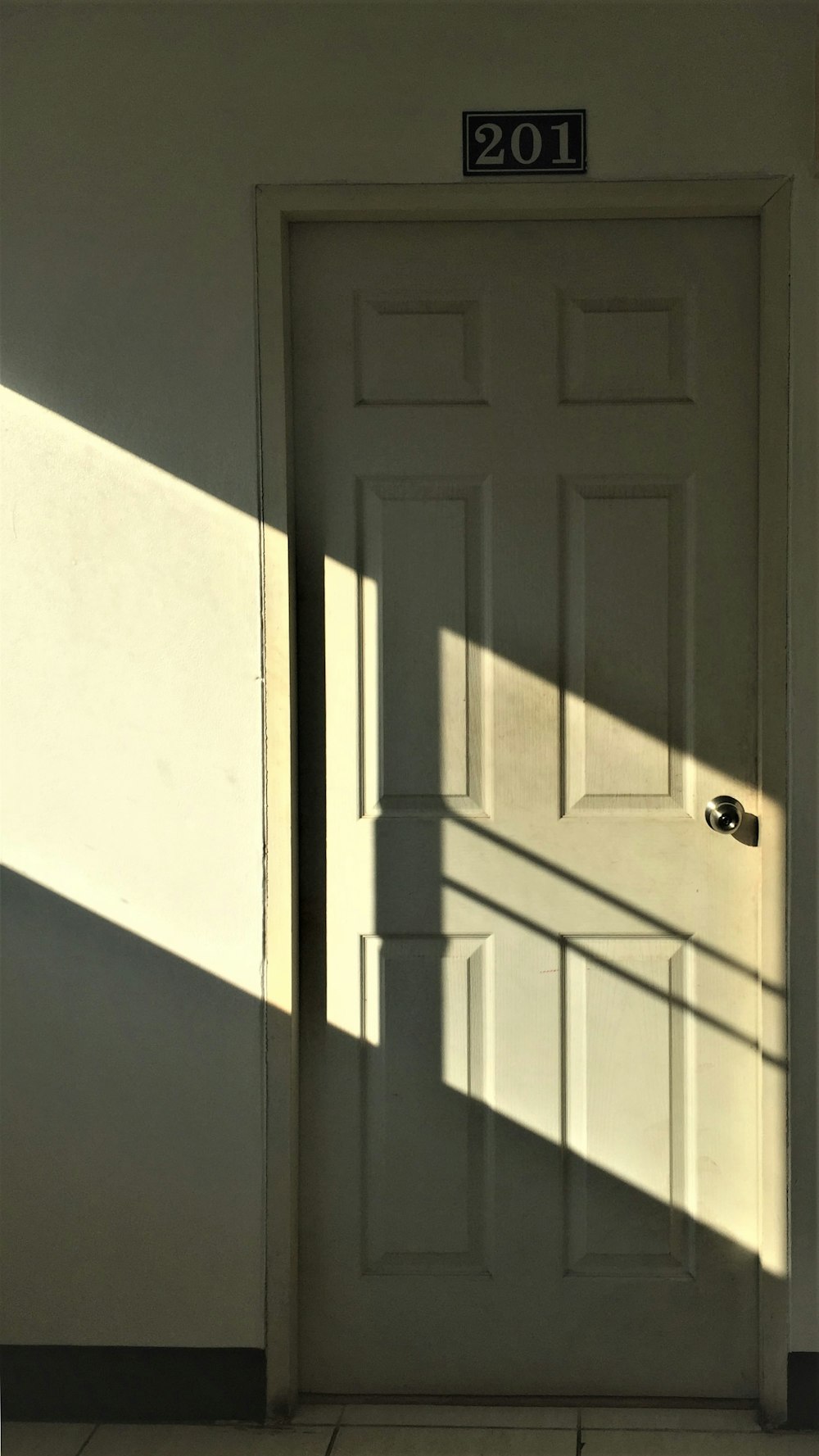 white wooden 6-panel door