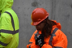 woman wearing red hard hat