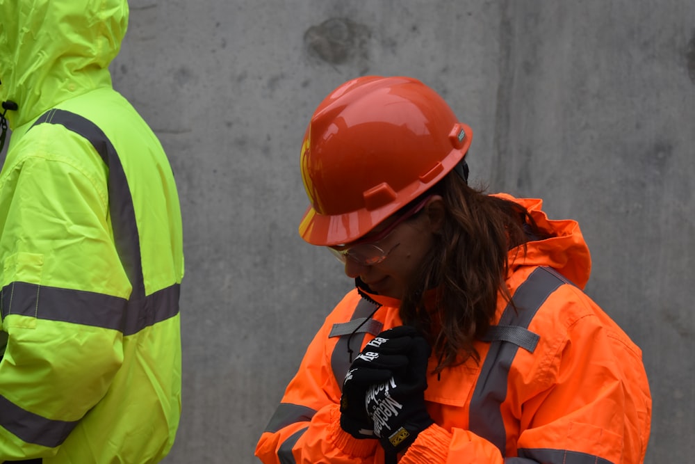 woman wearing red hard hat