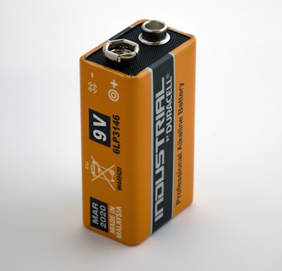 orange 9V Duracell battery