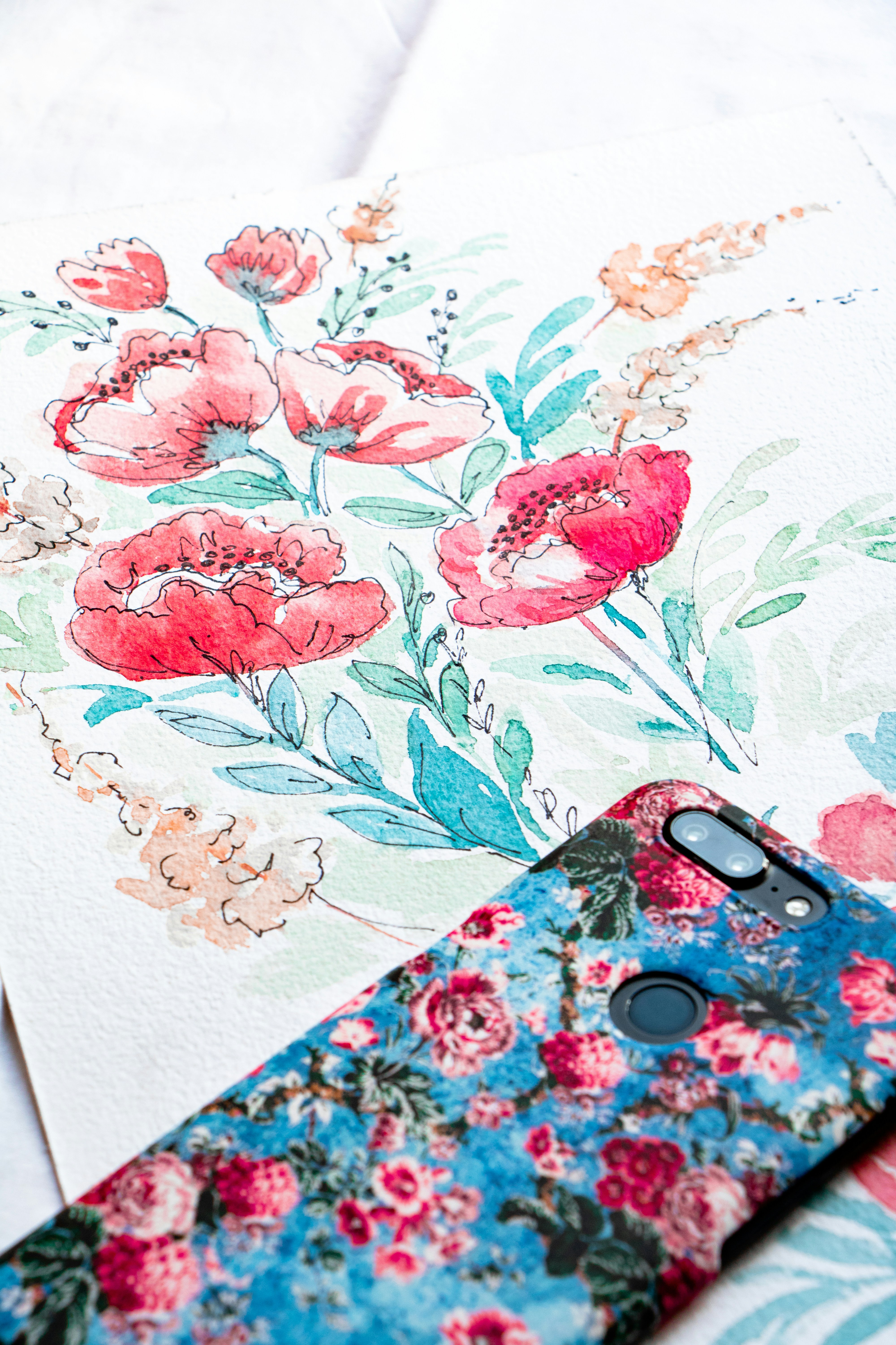 A designer sketching wireframes on a tablet.