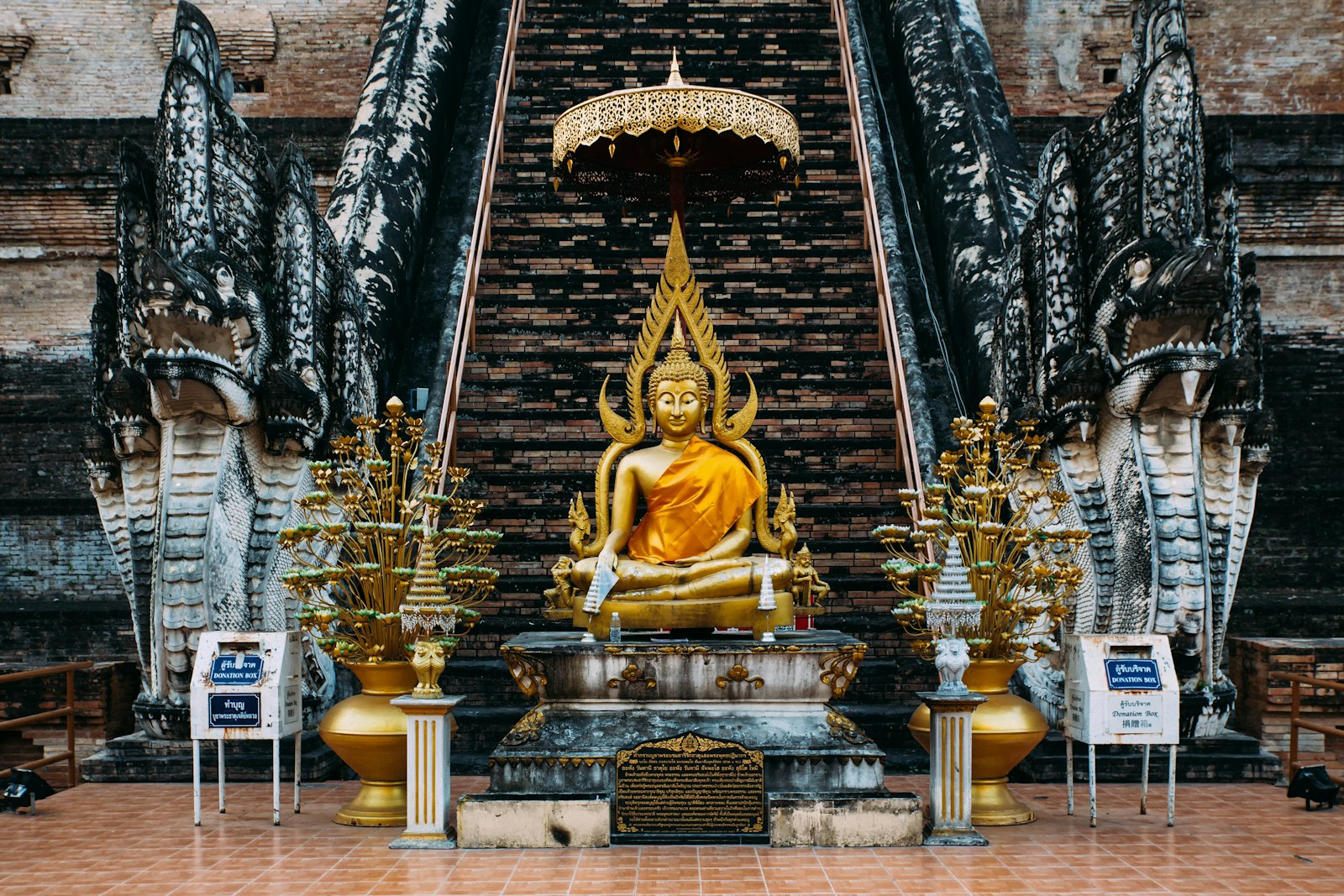 Sigma 24-70mm F2.8 EX DG Macro sample photo. Golden buddha by stairs photography