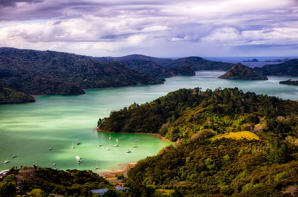 aerial view of mountain and body of water