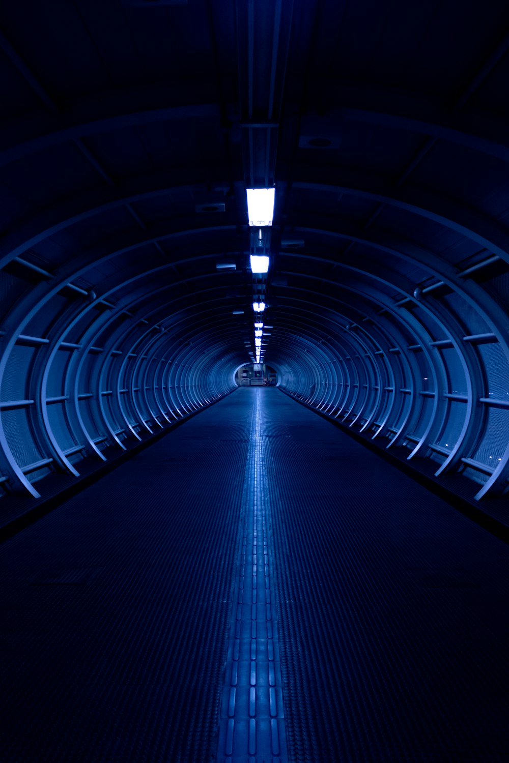 empty hallway with lights turned on