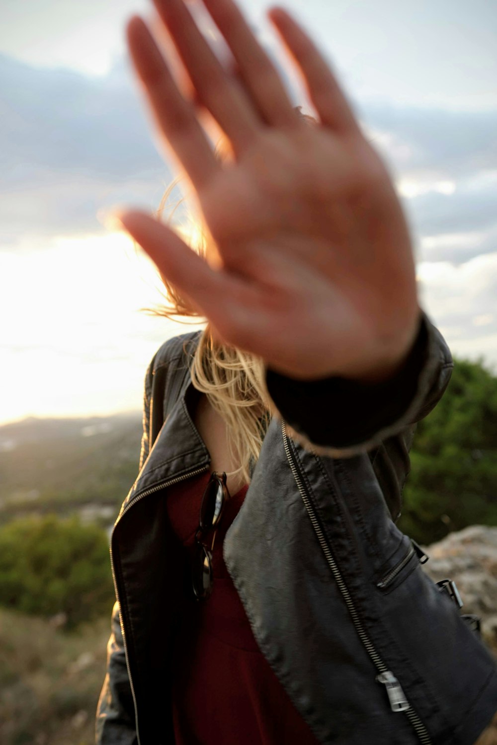 person in black jacket in selective focus photography